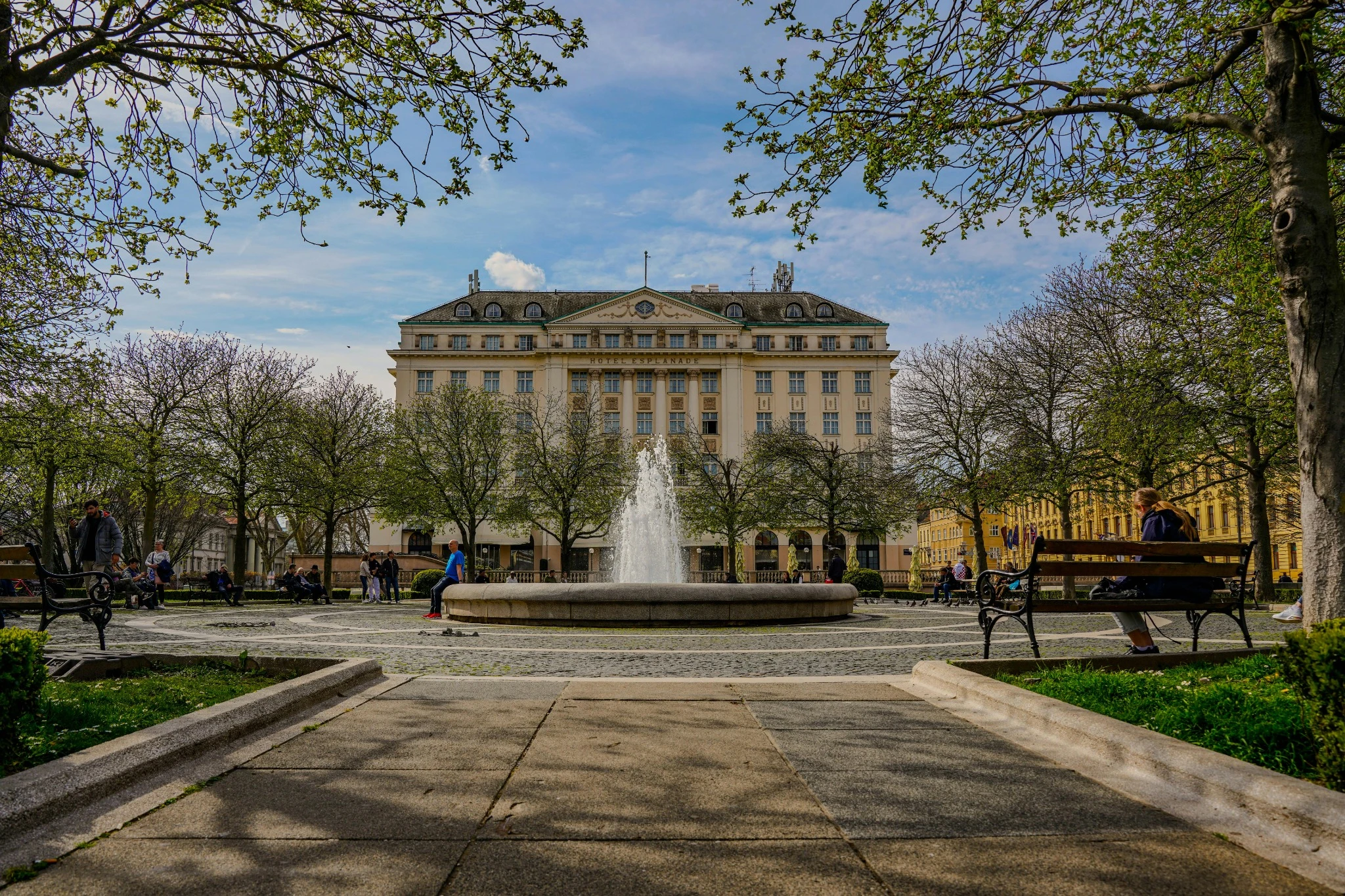The 1925 Hotel Esplanade Zagreb seen from Strossmayer Park, with its fountain and chestnut trees in the foreground — Croatia's grande dame Art Deco hotel and former Orient Express landmark